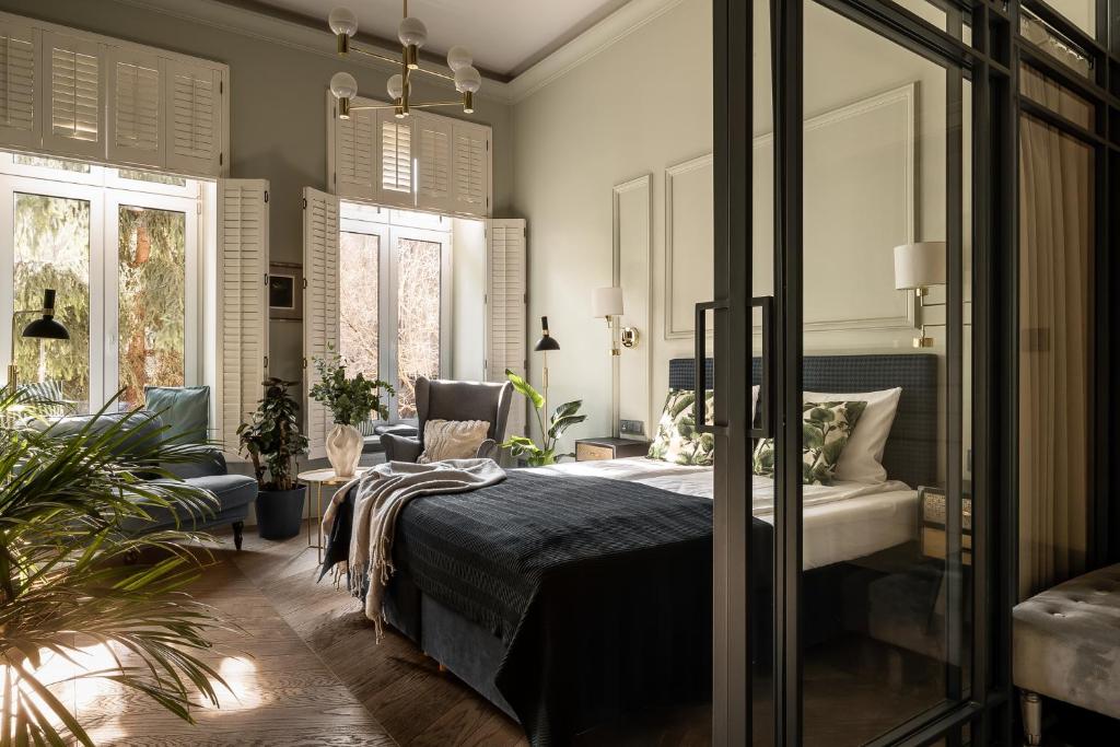 Ένα ή περισσότερα κρεβάτια σε δωμάτιο στο Moja apartments