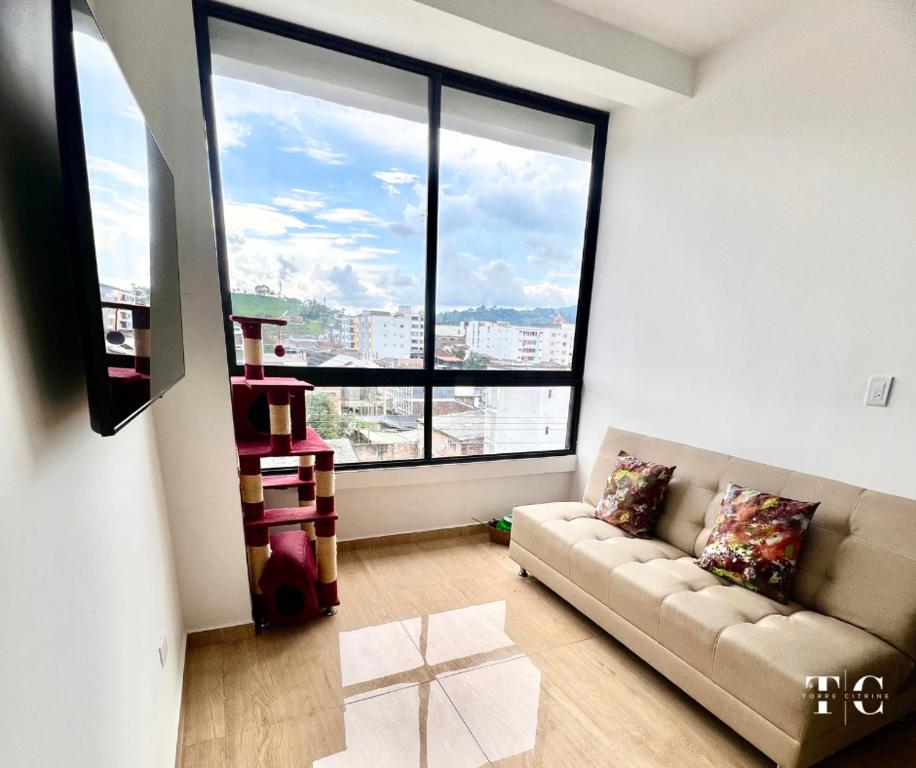 Posezení v ubytování Welcome to Santa Rosa de Cabal Habitación y baño privado a 5 minutos del centro en apartamento habitado por la anfitriona