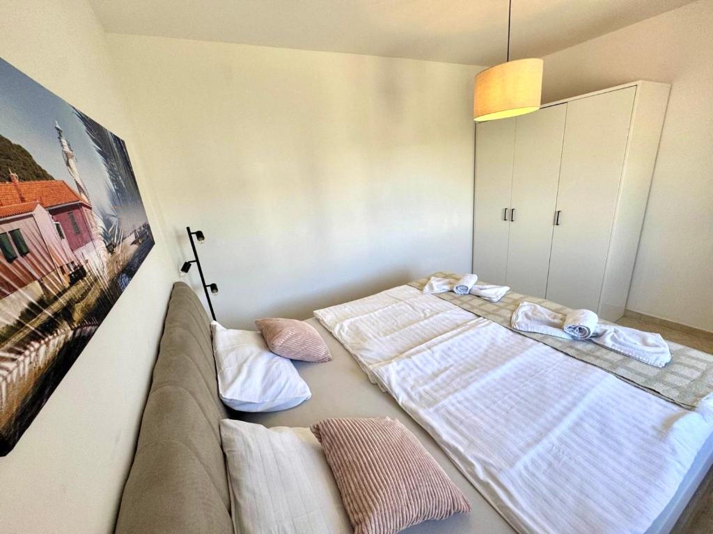 Postel nebo postele na pokoji v ubytování Villa Punta