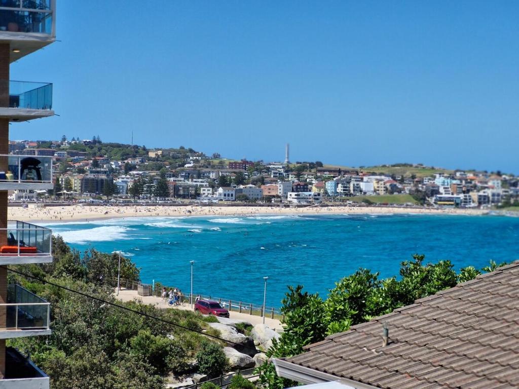a view of a beach from a building at Eliza's Island in Sydney