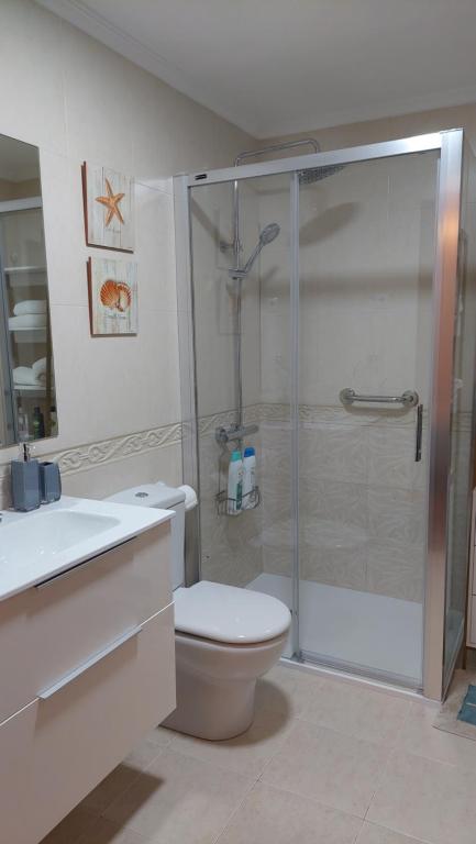 Kúpeľňa v ubytovaní Apartamento en la playa con parking privado