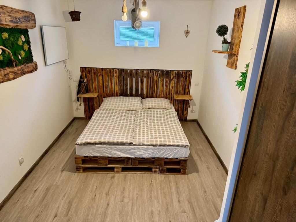 Postel nebo postele na pokoji v ubytování Apartmány Apollo