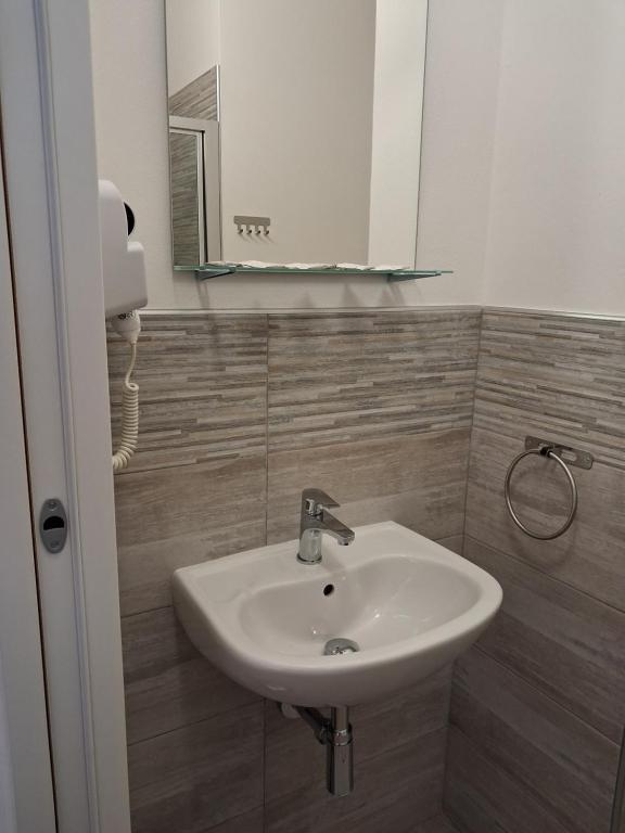 Koupelna v ubytování Albergo Conca d'Oro