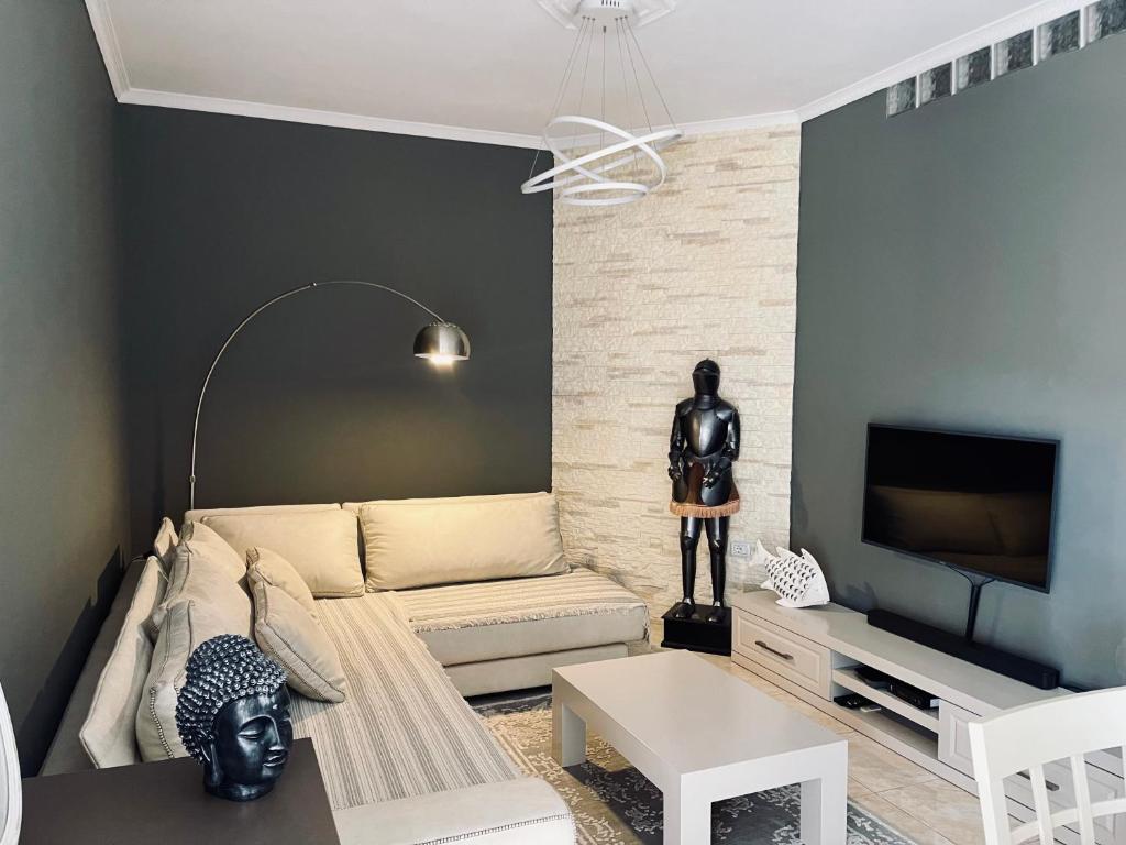 Μια τηλεόραση ή/και κέντρο ψυχαγωγίας στο Belas Apartment