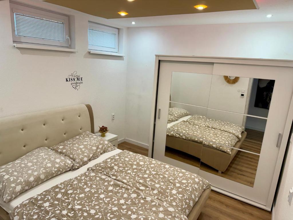 Postel nebo postele na pokoji v ubytování Apartmány Apollo
