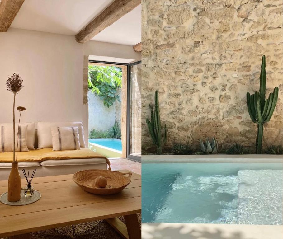 une villa avec piscine et une chambre avec un lit et une table dans l'établissement La Maison du Puisatier • Centre historique • Piscine chauffée •Jardin, à Uzès