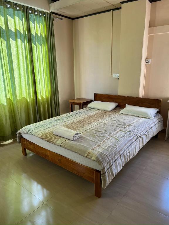 Postel nebo postele na pokoji v ubytování Zaras Cottage