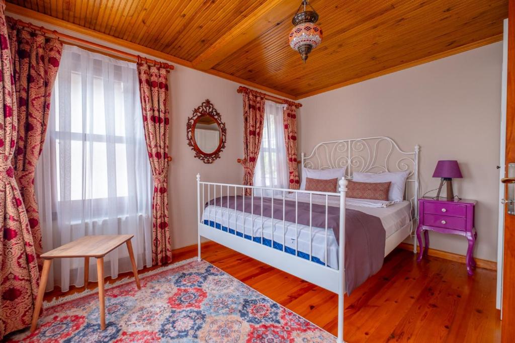 Postel nebo postele na pokoji v ubytování Çınarlı hotel