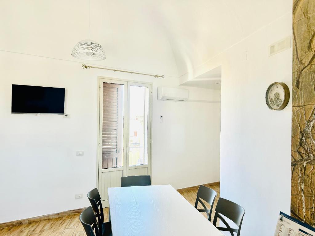 TV a/nebo společenská místnost v ubytování Spazioso Appartamento da Maria