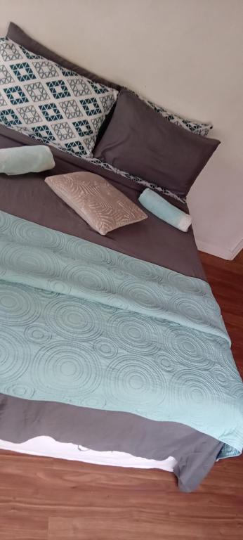 Postel nebo postele na pokoji v ubytování Chandler Homestay