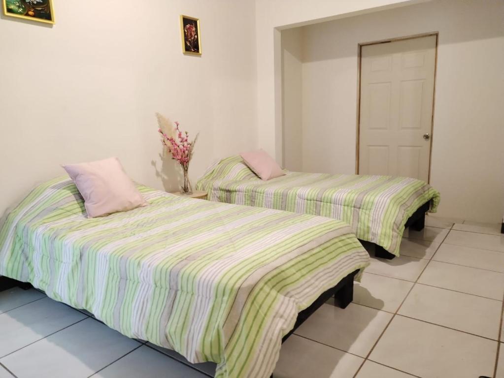 Postel nebo postele na pokoji v ubytování Felipe Bed Breakfast