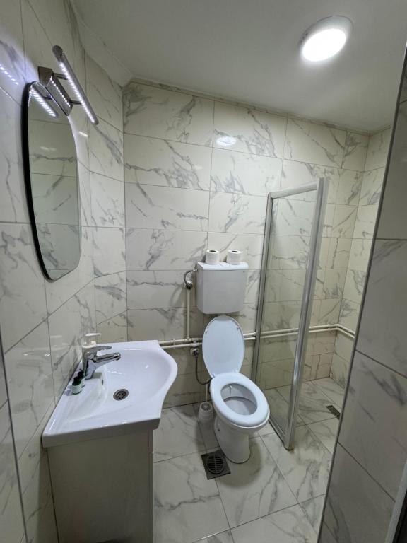 Koupelna v ubytování Hotel Palma