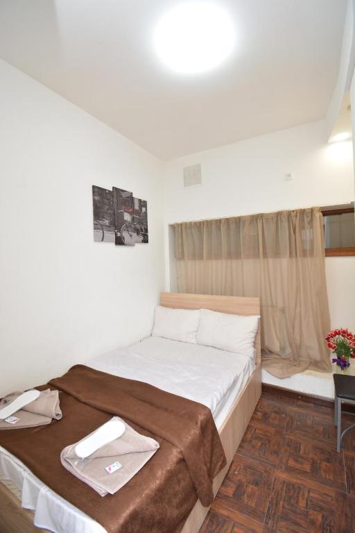 Postel nebo postele na pokoji v ubytování hotel Pushkin