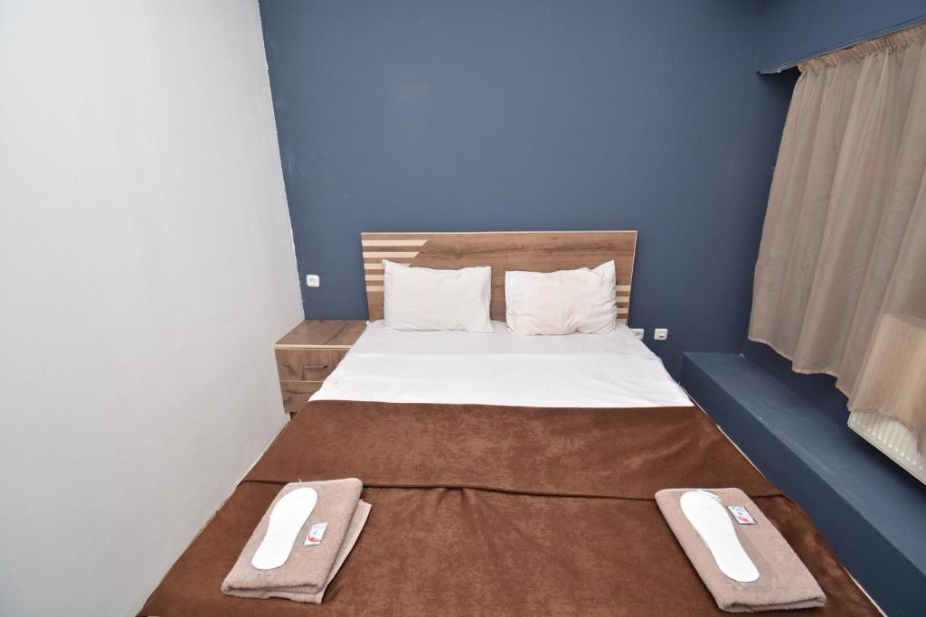 Postel nebo postele na pokoji v ubytování hotel Pushkin