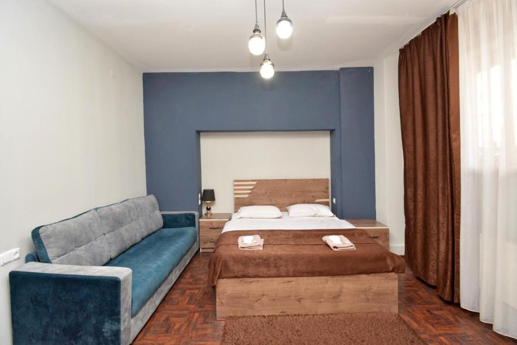 Postel nebo postele na pokoji v ubytování hotel Pushkin
