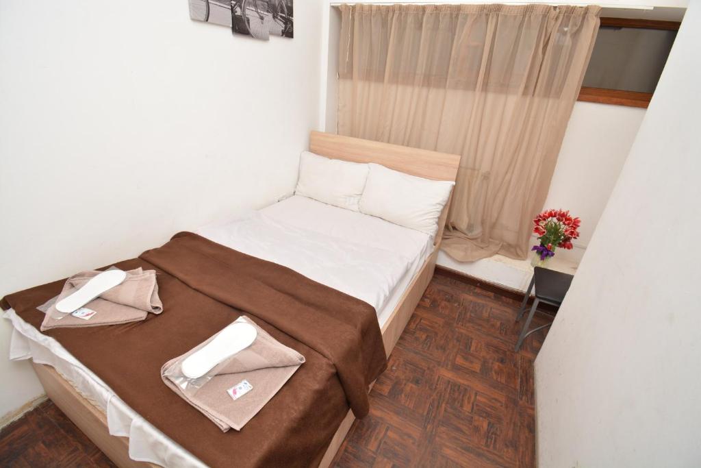 Postel nebo postele na pokoji v ubytování hotel Pushkin