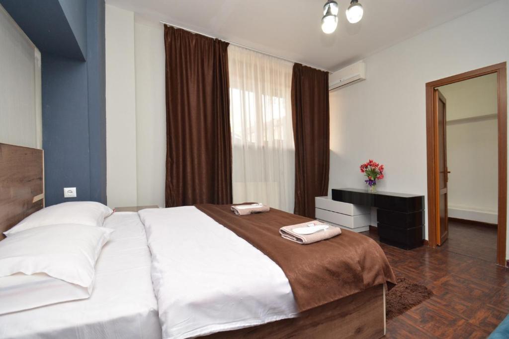 Postel nebo postele na pokoji v ubytování hotel Pushkin