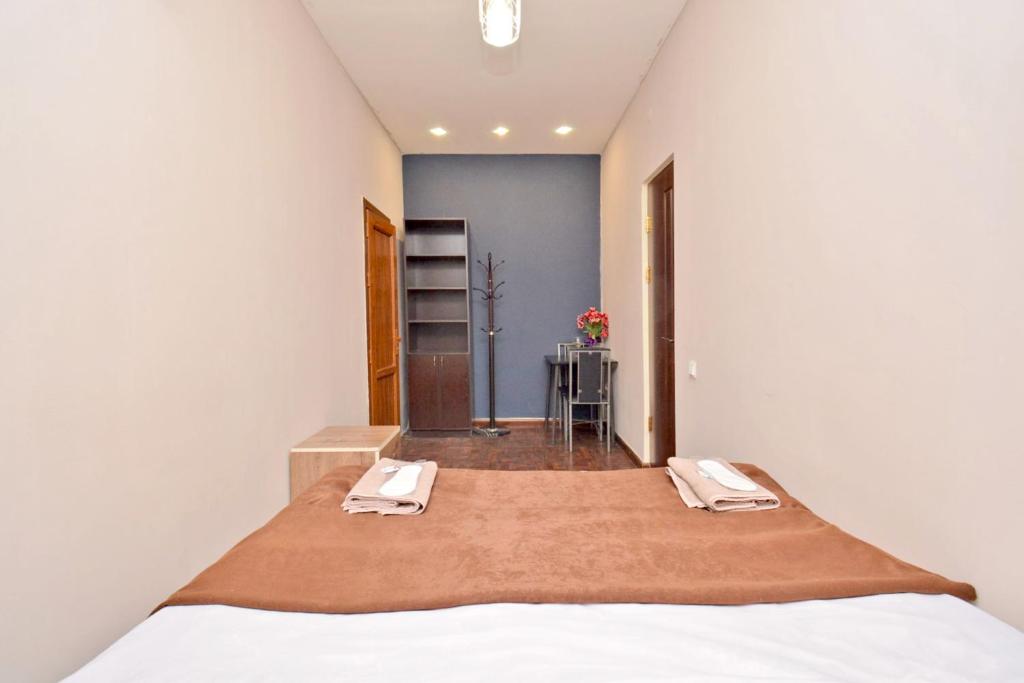 Postel nebo postele na pokoji v ubytování hotel Pushkin