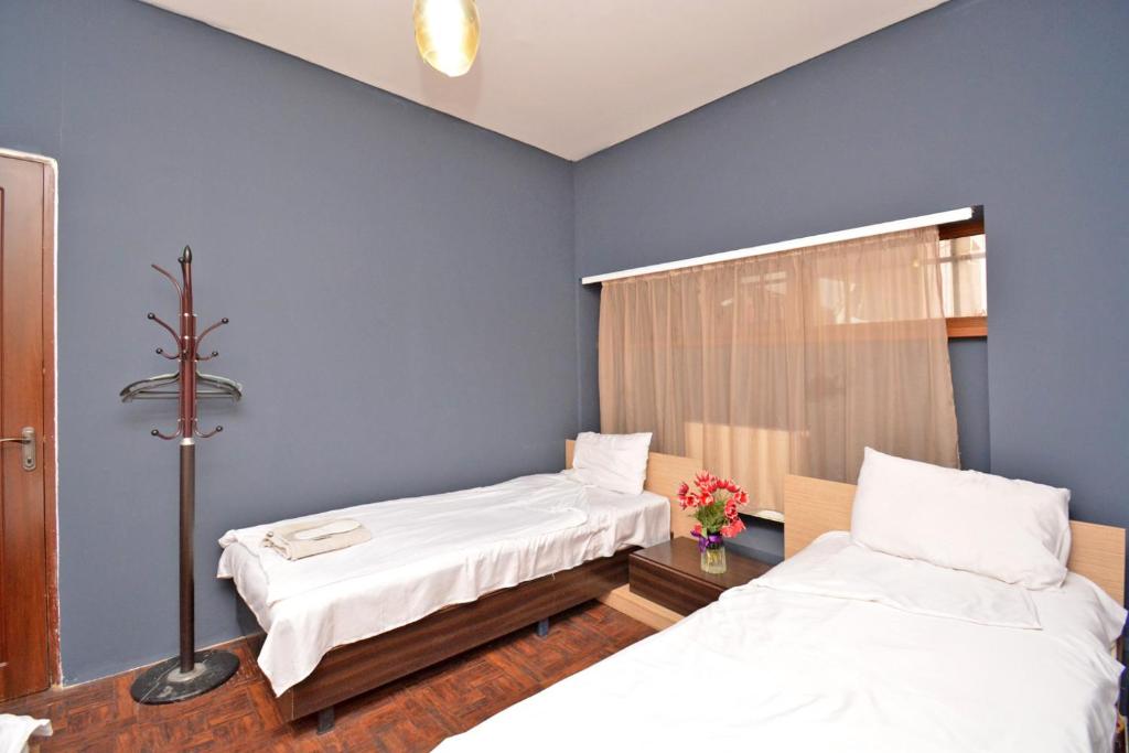 Postel nebo postele na pokoji v ubytování hotel Pushkin