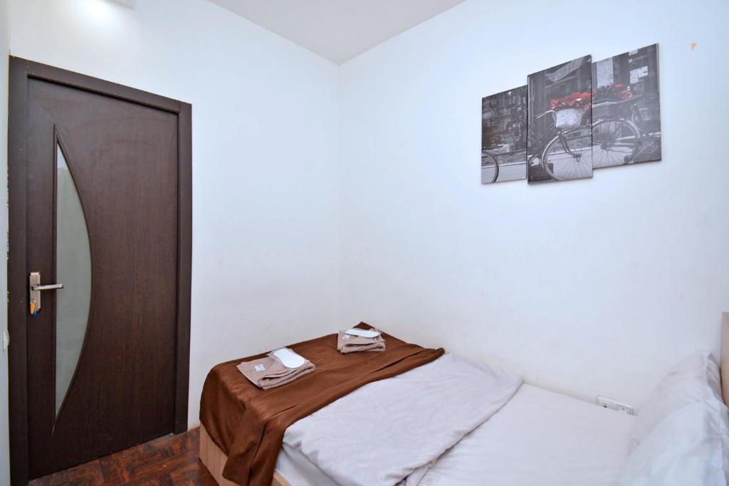 Postel nebo postele na pokoji v ubytování hotel Pushkin