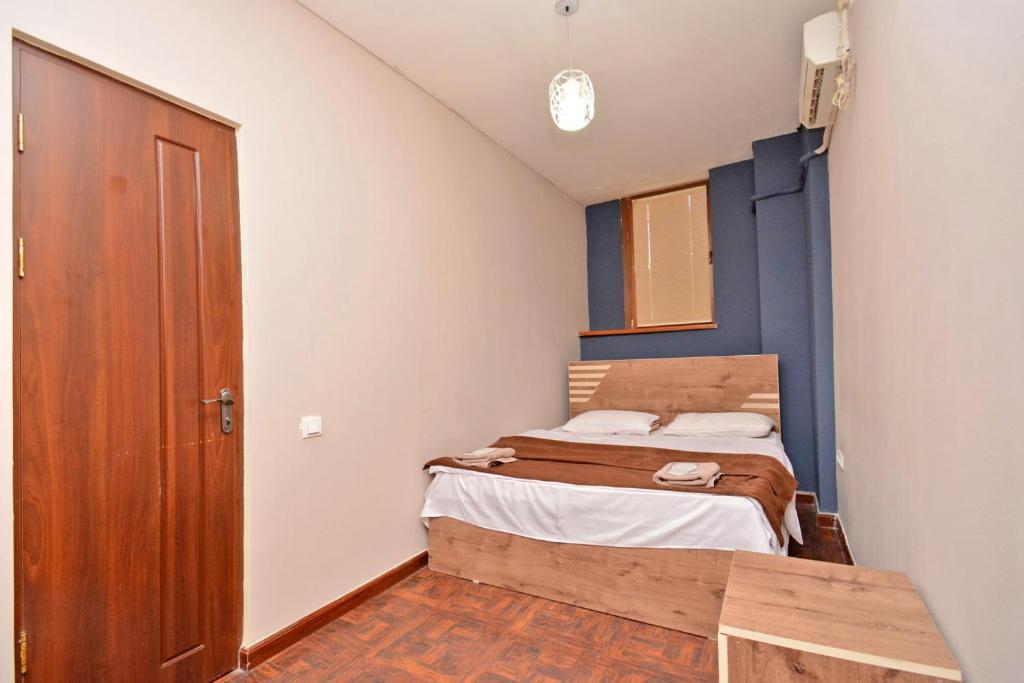 Postel nebo postele na pokoji v ubytování hotel Pushkin