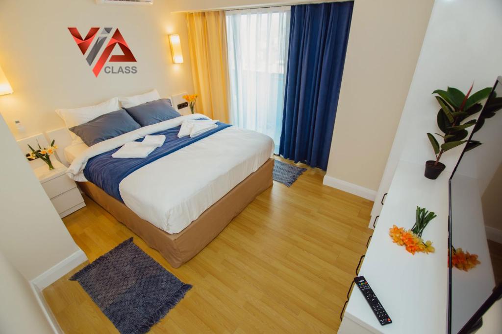 Postel nebo postele na pokoji v ubytování VIP CLASS ꙳ ORBI CITY