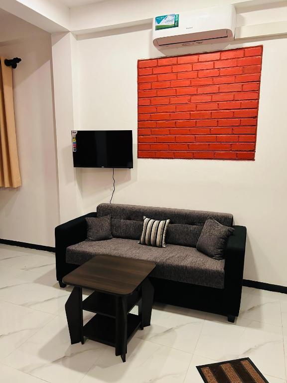 TV a/nebo společenská místnost v ubytování Unic Residence And Transit Hotel