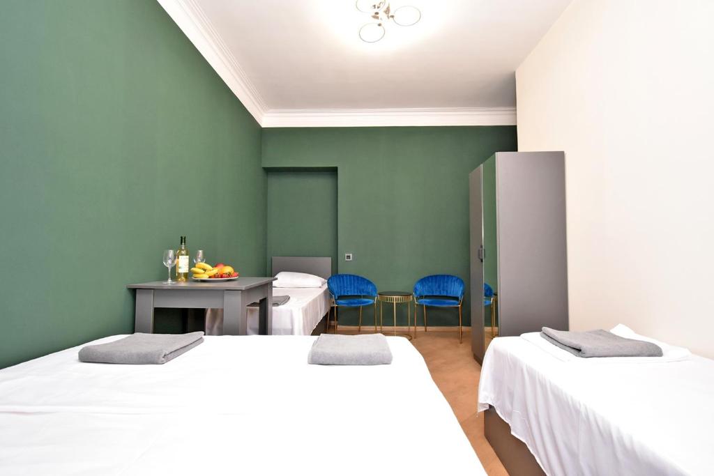 Postel nebo postele na pokoji v ubytování Tumanyan guest house