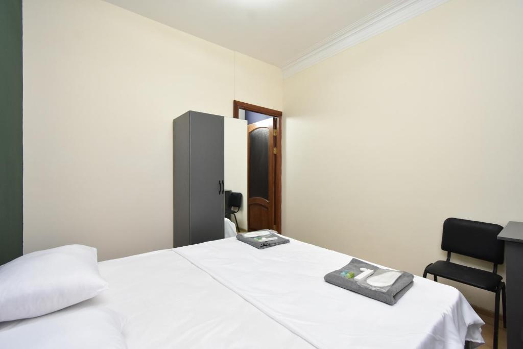 Postel nebo postele na pokoji v ubytování Tumanyan guest house