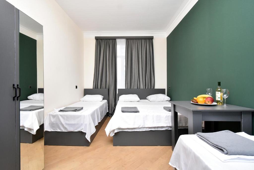 Postel nebo postele na pokoji v ubytování Tumanyan guest house