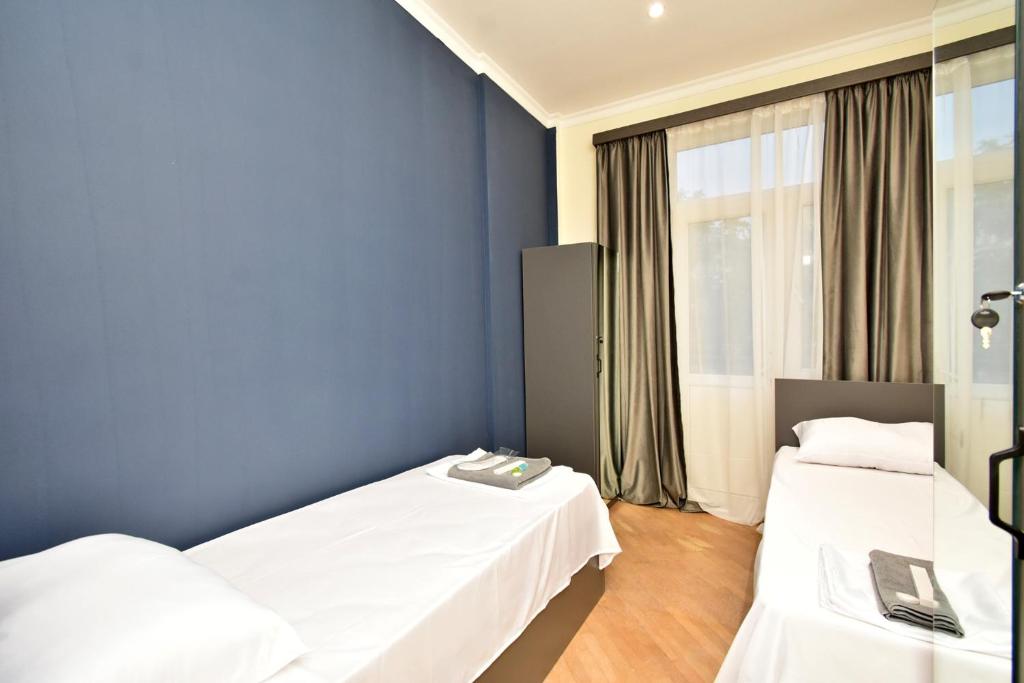 Postel nebo postele na pokoji v ubytování Tumanyan guest house