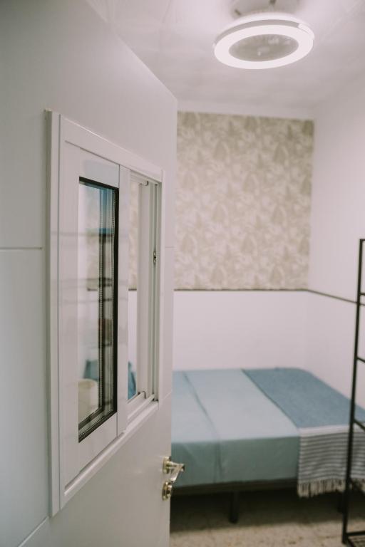 Postel nebo postele na pokoji v ubytování Kite and Surf - Private Rooms