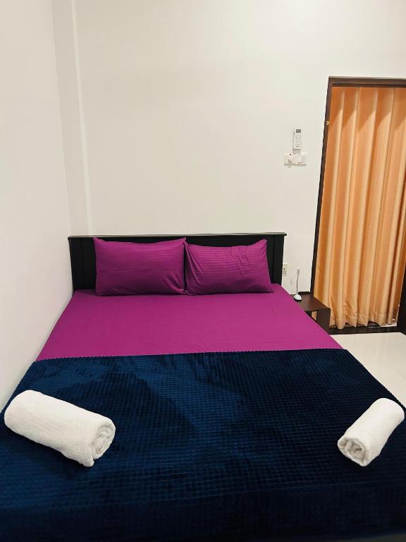 Postel nebo postele na pokoji v ubytování Unic Residence And Transit Hotel