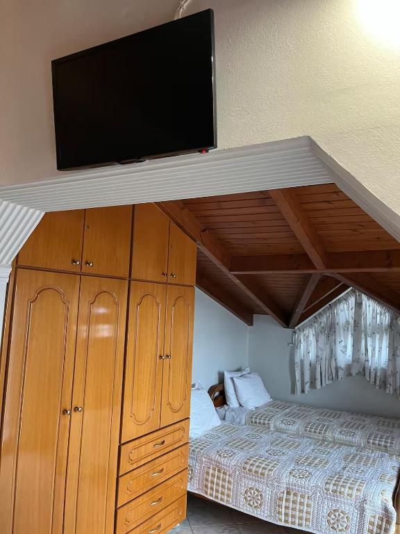Postel nebo postele na pokoji v ubytování Akti Arcoudi