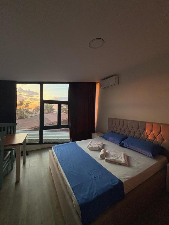 Postel nebo postele na pokoji v ubytování Saint Tropez Durres