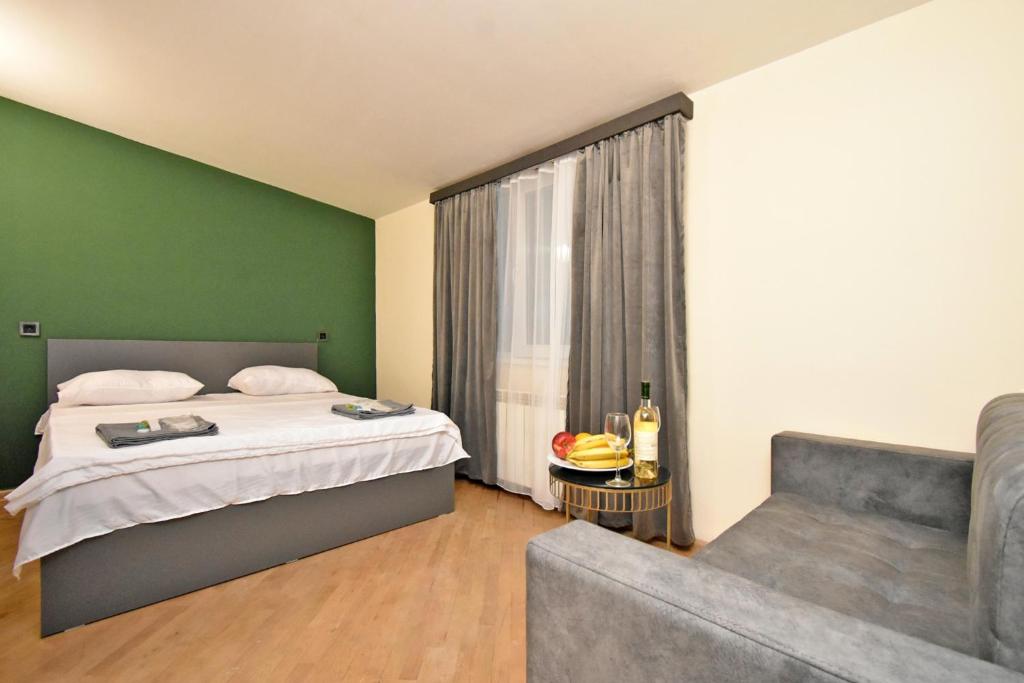 Postel nebo postele na pokoji v ubytování Tumanyan guest house