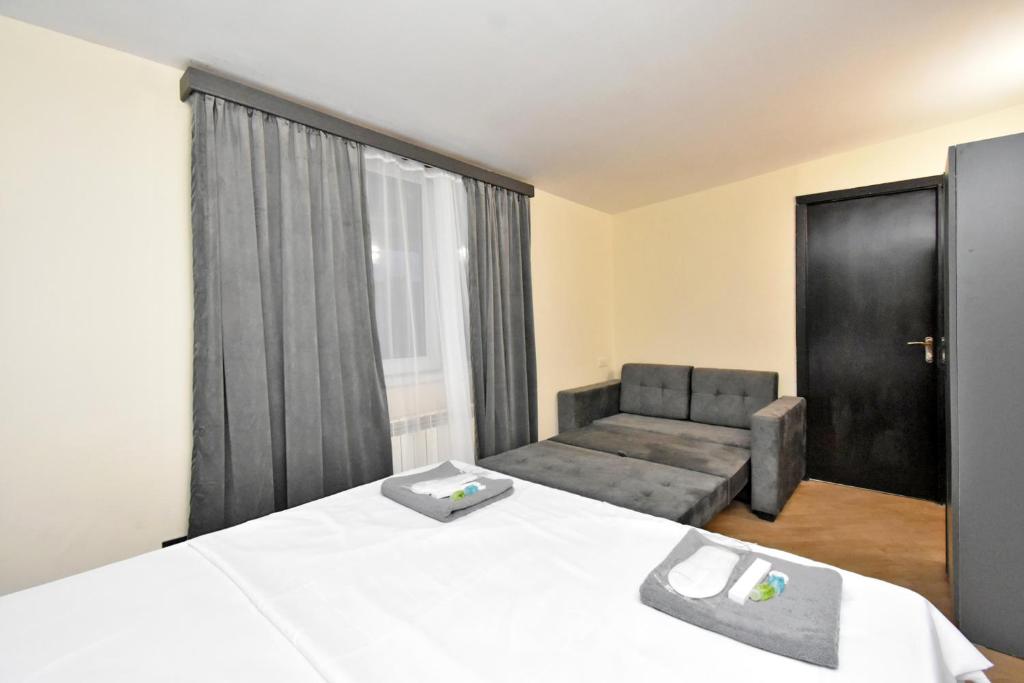 Postel nebo postele na pokoji v ubytování Tumanyan guest house