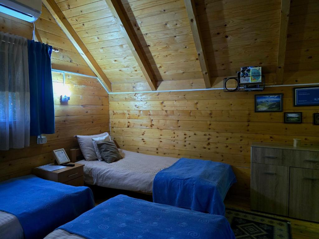 Postel nebo postele na pokoji v ubytování Tara Riverside