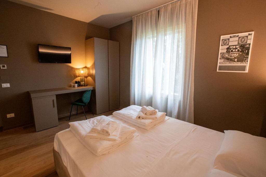 Postel nebo postele na pokoji v ubytování Tosa Welcome