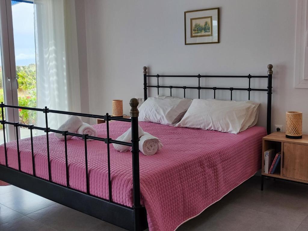 Posteľ alebo postele v izbe v ubytovaní Amfitriti's Apartment