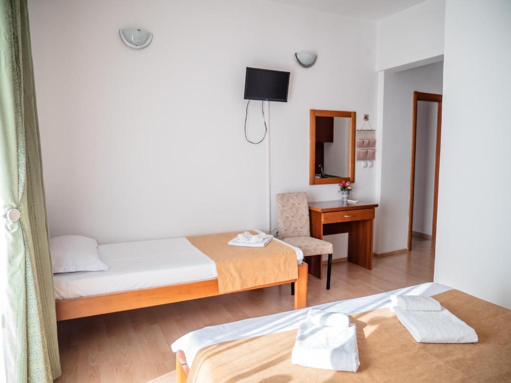 Postel nebo postele na pokoji v ubytování Apartments Bonita