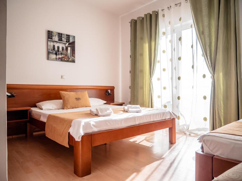 Postel nebo postele na pokoji v ubytování Apartments Bonita