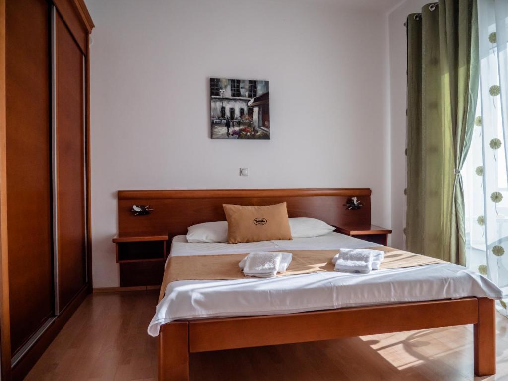 Postel nebo postele na pokoji v ubytování Apartments Bonita