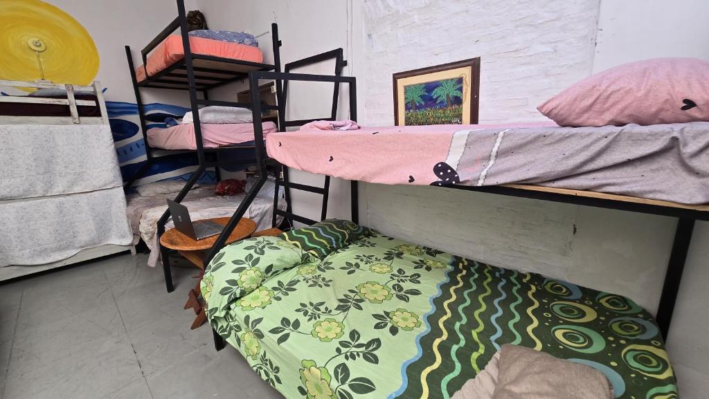 Postel nebo postele na pokoji v ubytování La Petite Maison de Diana
