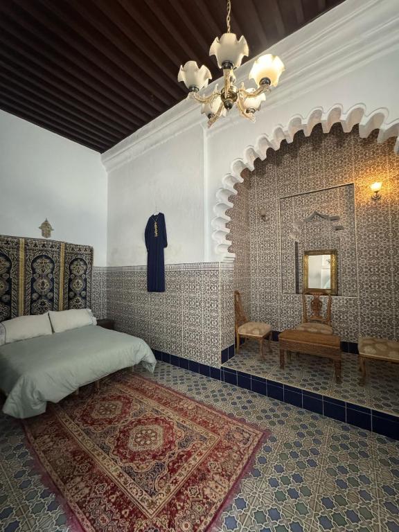 Postel nebo postele na pokoji v ubytování Riad Zahara