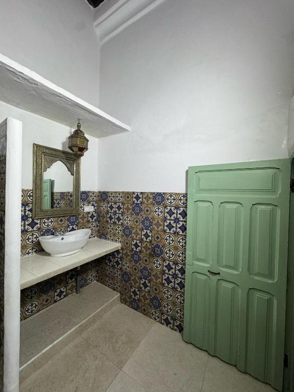 Koupelna v ubytování Riad Zahara