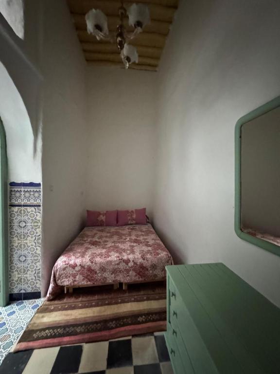 Postel nebo postele na pokoji v ubytování Riad Zahara