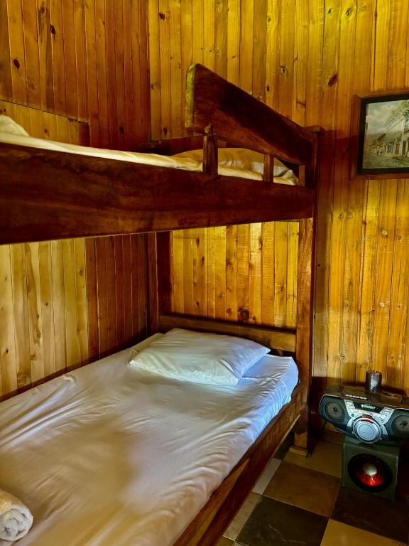 Postel nebo postele na pokoji v ubytování BioHotel Ecohouse