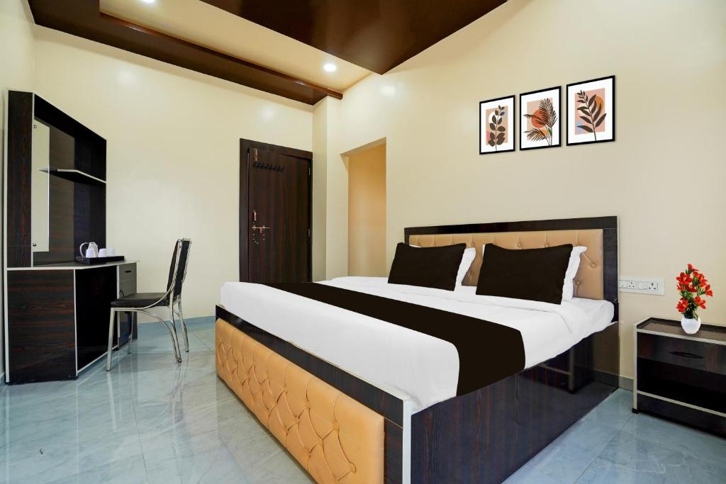 Postel nebo postele na pokoji v ubytování Super Hotel O Dabha Hilltop