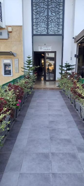 Facaden eller indgangen til INOU Hotel